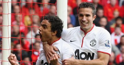 Rafael: Celebrates his goal against Liverpool at Anfield
